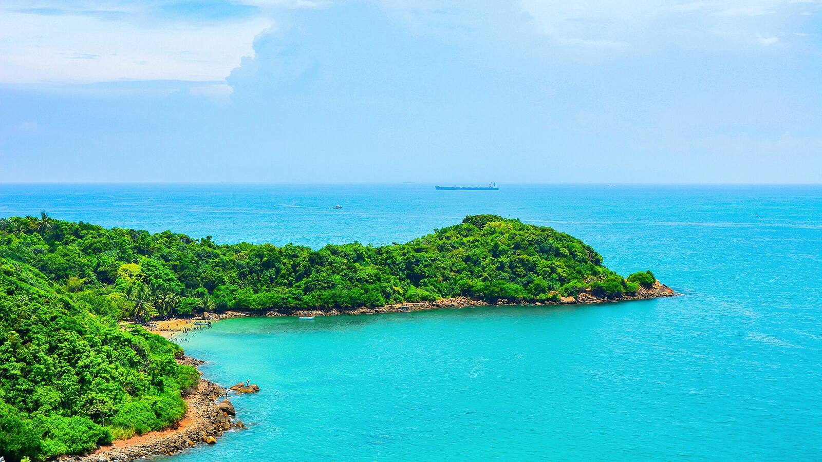 Jungle Beach, a small cove below the forested Rumassala headland near Unawatuna